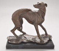 Lot 388 - A brown patinated bronze whippet, modelled in...