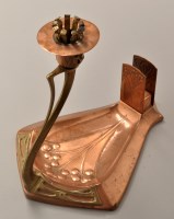 Lot 442 - WMF: a copper and brass candlestick, the...