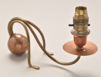 Lot 443 - Carl Deffner: a copper and brass candlestick,...