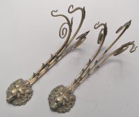 Lot 464 - A pair of 19th Century patinated metal wall...