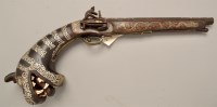 Lot 516 - An Eastern or North African flintlock pistol...