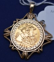Lot 553 - An Elizabeth II gold half sovereign, 1982, in...