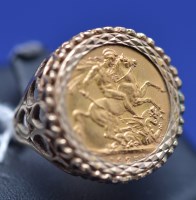 Lot 557 - A George V gold sovereign, 1925, in 9ct....