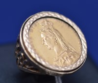 Lot 565 - A Victorian gold sovereign, 1890, in 9ct....