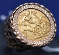 Lot 570 - A George V gold sovereign, 1912, in 9ct....