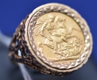 Lot 576 - An Edward VII gold sovereign, 1910, in 9ct....