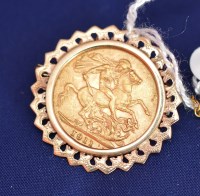 Lot 592 - A George V gold sovereign, 1911, in 9ct....