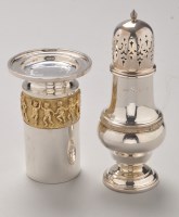 Lot 674 - An Elizabeth II silver and silver gilt candle...