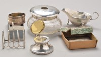 Lot 676 - A George V glass and silver hat pin pot, by...