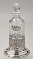 Lot 688 - An early 20th Century silver decanter stand,...