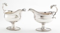 Lot 691 - A pair of George III silver gravy boats, by...