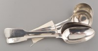 Lot 699 - A pair of George III silver sauce ladles, by...