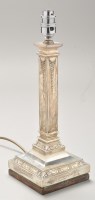 Lot 718 - George V silver column form table lamp, by...