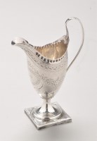 Lot 722 - A George III silver cream jug, with double...