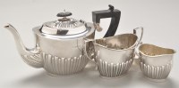 Lot 738 - An Edwardian silver three-piece tea service,...