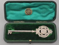 Lot 764 - An Edwardian silver presentation key, by S....