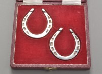 Lot 776 - A pair of Elizabeth II miniature horse shoes,...