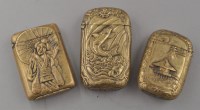 Lot 807 - An embossed brass Chinese style vesta case, in...