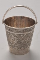 Lot 812 - A Middle-Eastern silver holder in the form of...