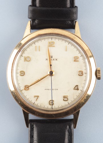Lot 831 - Rolex Precision: a gentleman's 9ct. gold cased...