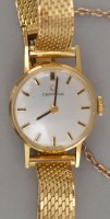 Lot 847 - Certina: a lady's 18ct. gold bracelet watch,...