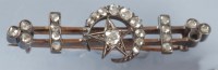 Lot 859 - A Victorian diamond brooch, the double rail...