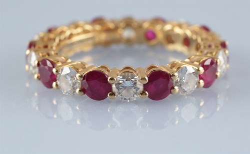 Lot 875 - Tiffany & Co: a ruby and diamond Embrace...