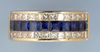 Lot 882 - A sapphire and diamond dress ring, set with a...