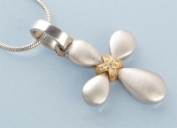 Lot 895 - A diamond, white and yellow metal modern style...