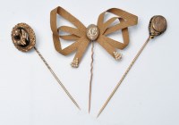 Lot 906 - Three mourning tie pins, one of plaited hair,...