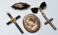 Lot 911 - Victorian mourning jewellery, to include: an...