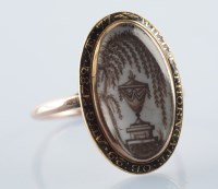 Lot 913 - An 18th Century mourning ring, the central...