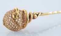 Lot 916 - A 19th Century tie pin, decorated with plaited...