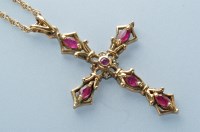 Lot 923 - A ruby and diamond set 9ct. yellow gold Gothic...