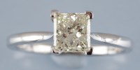 Lot 926 - A solitaire diamond ring, the princess cut...