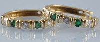 Lot 931 - A pair of emerald and diamond earrings, each...