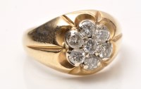 Lot 937 - A diamond cluster ring, the seven brilliant...