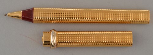 Lot 938 - A late 20th Century gold plated ball point pen...