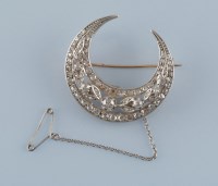 Lot 946 - A Victorian diamond crescent brooch, set with...