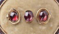 Lot 949 - Three Victorian garnet set and yellow metal...