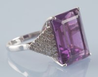 Lot 967 - An amethyst and diamond dress ring, the...