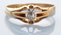 Lot 984 - A single and diamond ring, the old-cut diamond...