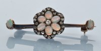 Lot 986 - A late Victorian opal and diamond cluster bar...