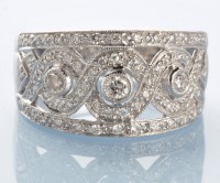 Lot 998 - A diamond dress ring, the three graduated...