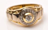 Lot 1000 - A gentleman's diamond ring, the central...