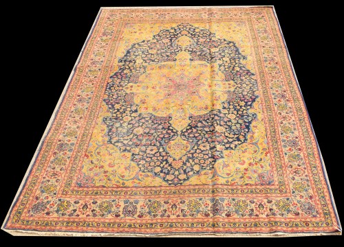 Lot 1025 - A Tabriz carpet, the central floral rosette...