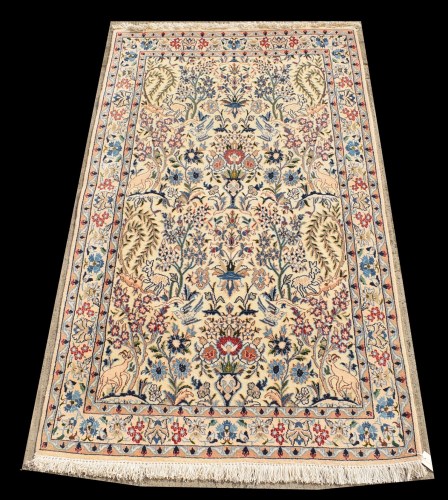 Lot 1027 - A Nain rug, with 'tree of life' design on...