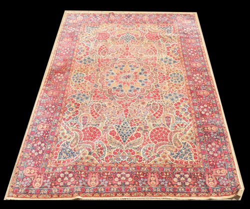 Lot 1028 - A Lavar Kirman carpet, with full floral...