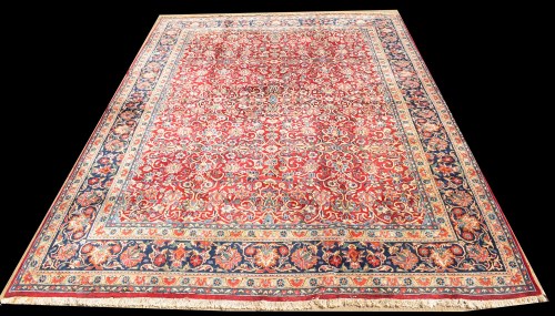 Lot 1029 - A Persian Yazd carpet, with full floral...