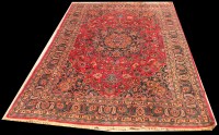 Lot 1032 - A Mashad carpet, central rosette surrounded by...